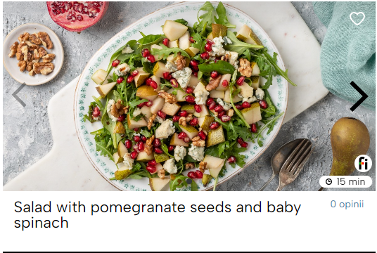 Salad with pomegranate seeds and baby spinach